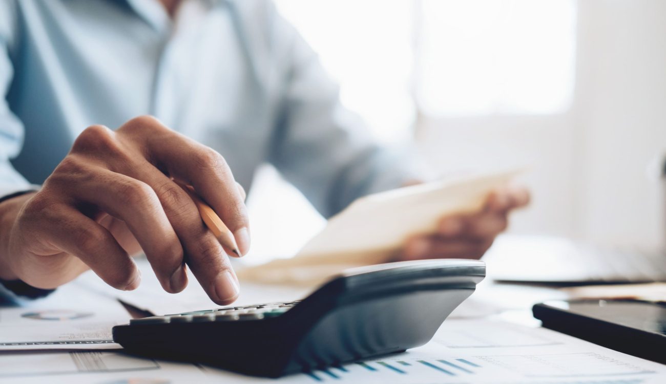 male-accountant-banker-use-calculator (1)